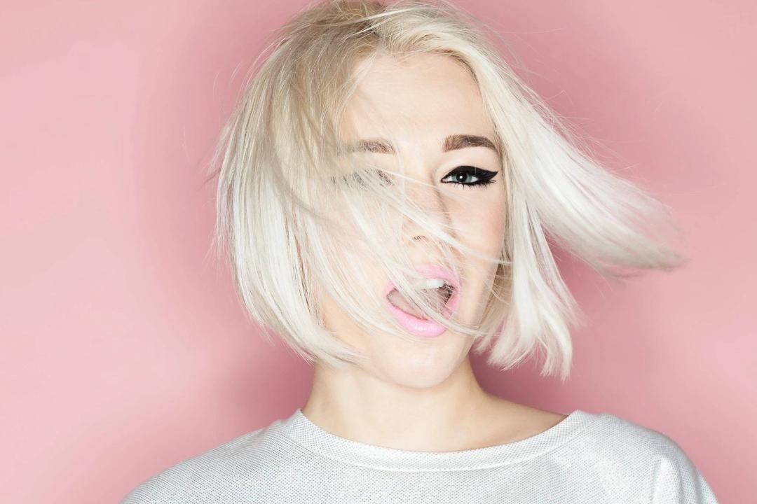 Platinum blonde bob hairstyle by professional Hot Springs hair stylist